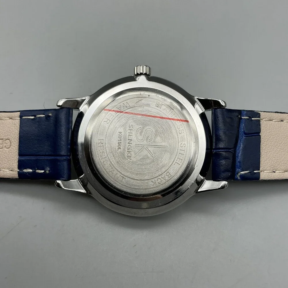 Shengke Womens Watch 32mm Silver Tone Blue Leather Band Date New Battery
